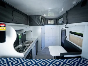 Upholstered dining area with adjustable table