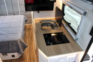 blue tongue hybrid caravan xh16l kitchenette with sink and induction cooktop