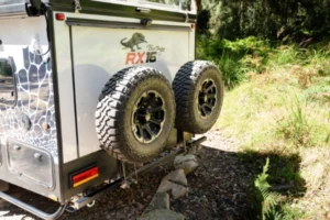 Rear-mounted spares and reversing camera